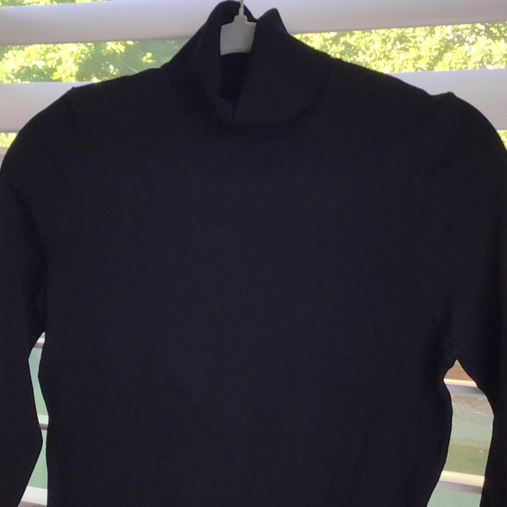 Brand new Diane von Furstenberg black turtleneck lightweight sweater.  Size M.